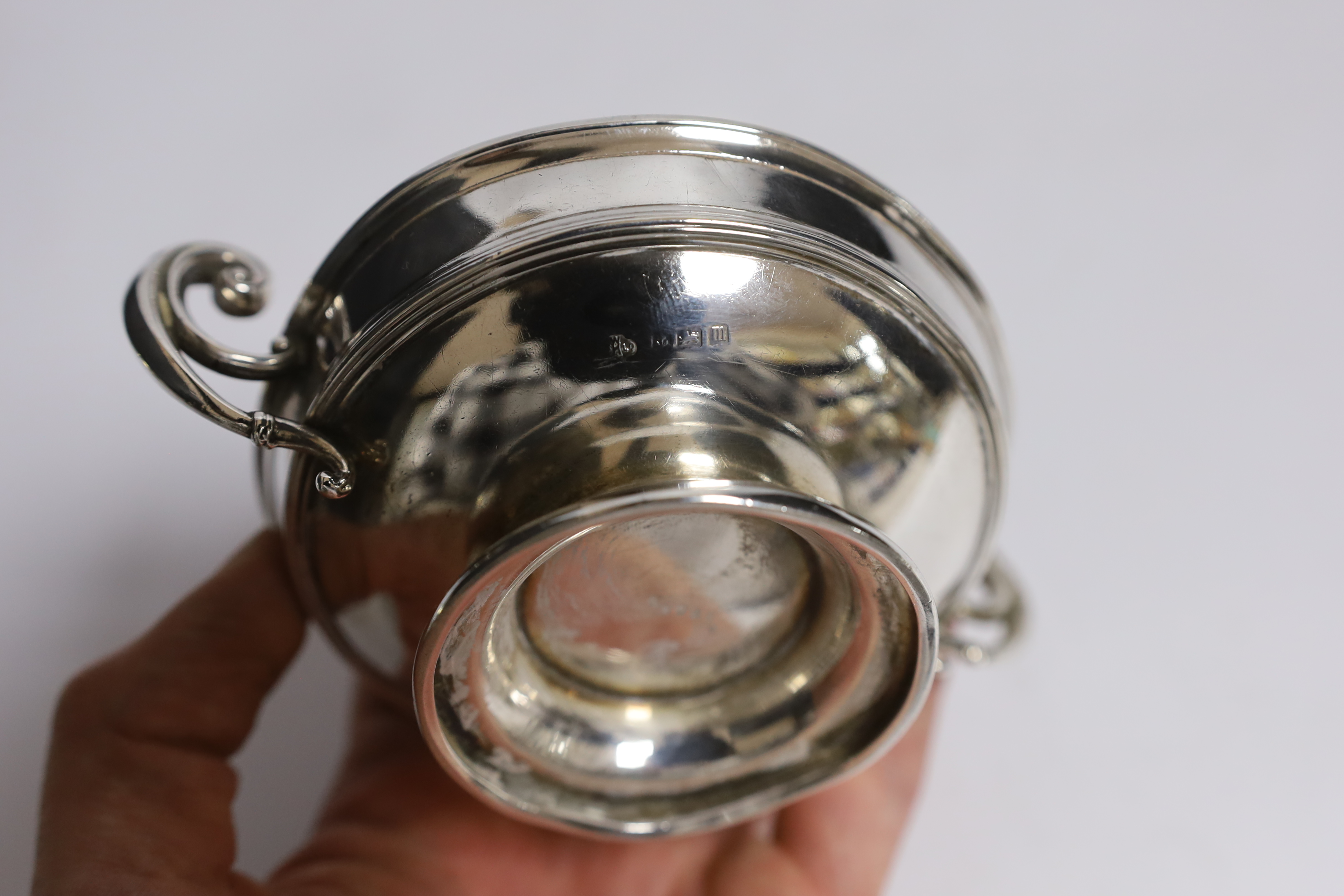 Two George V silver cream jugs, largest 12.5cm, a silver two handled pedestal bowl, a pierced small dish and set of six small silver coffee spoons.